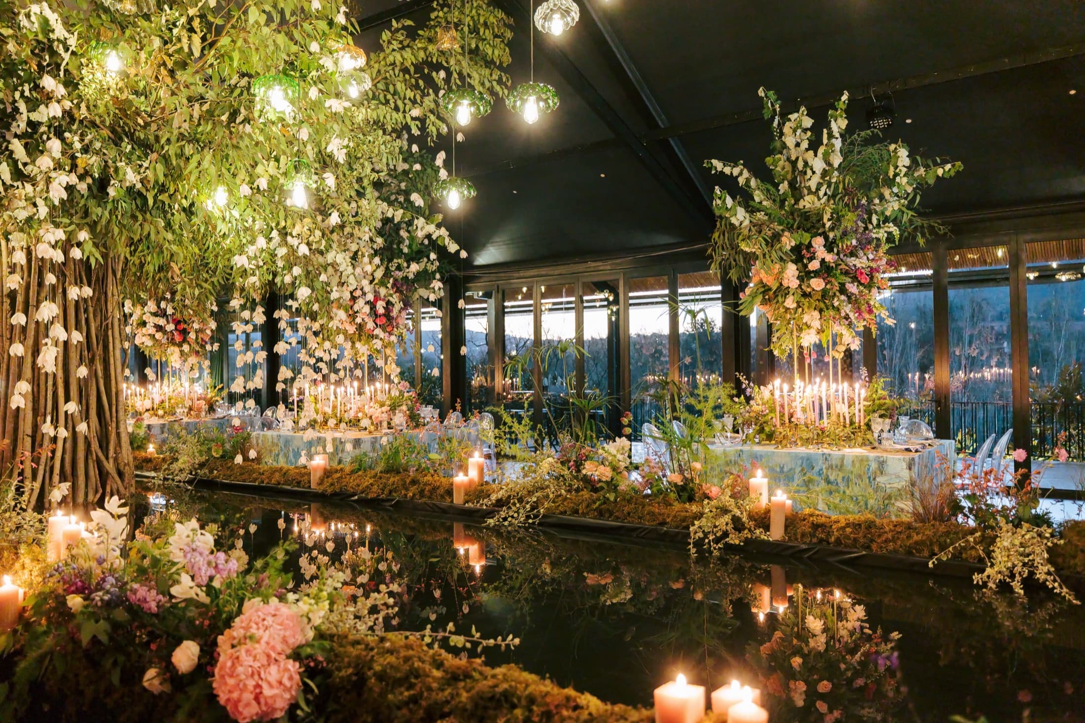 The flower school installation over the mirror pool
