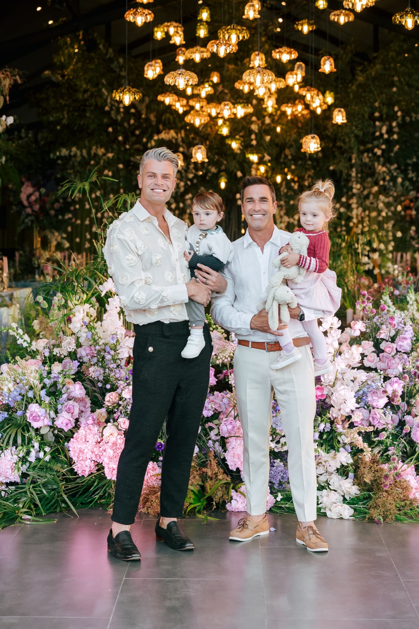 Zavion and John, founders of Inimitable, with their children