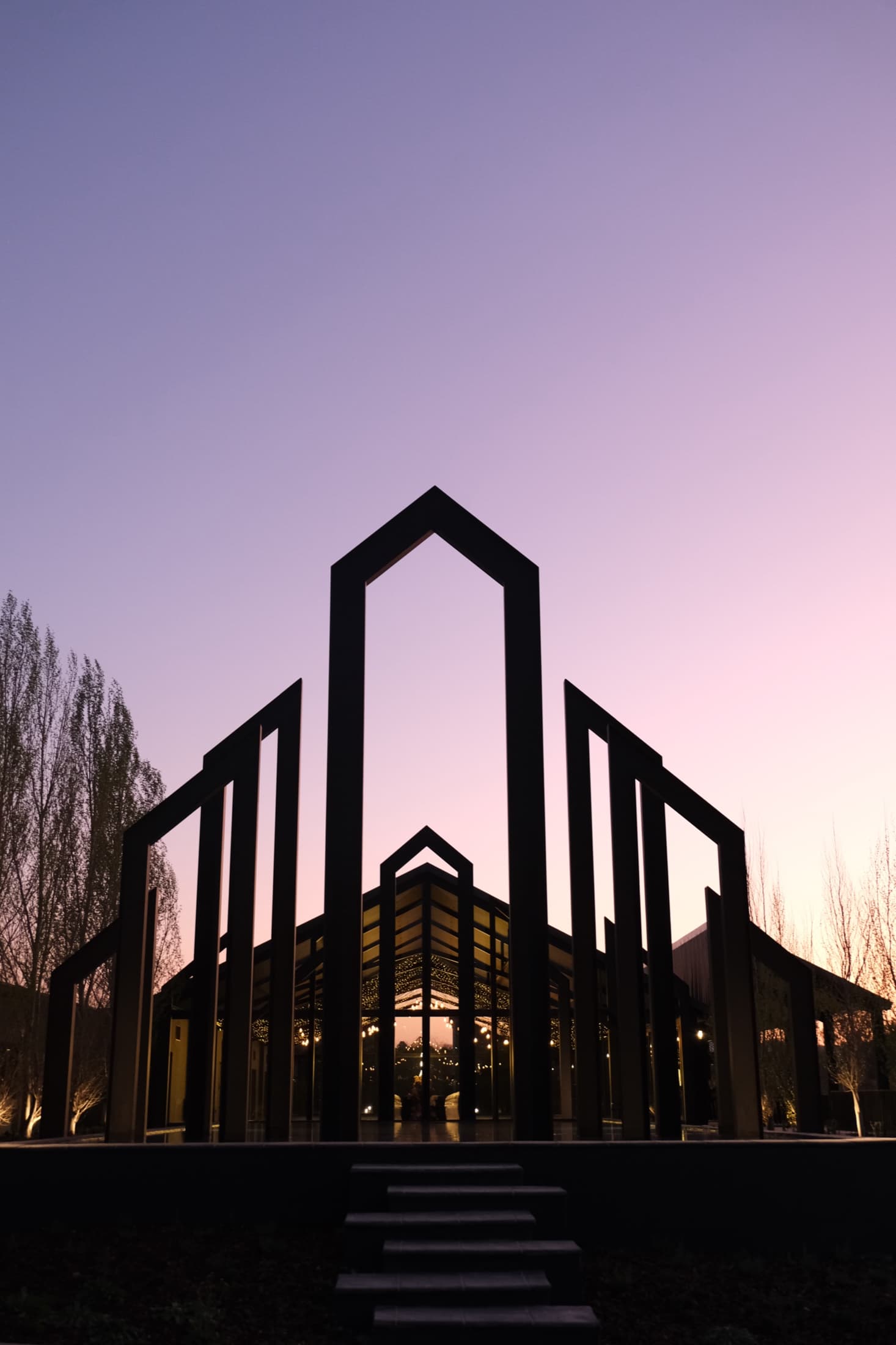 The gates against a dusk sky
